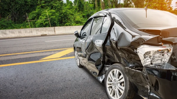 A woman has died and a man is critically injured after a collision in Banning Thursday morning.