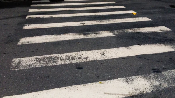 A pedestrian was struck and killed by a vehicle while crossing First Street in Santa Ana Sunday morning.