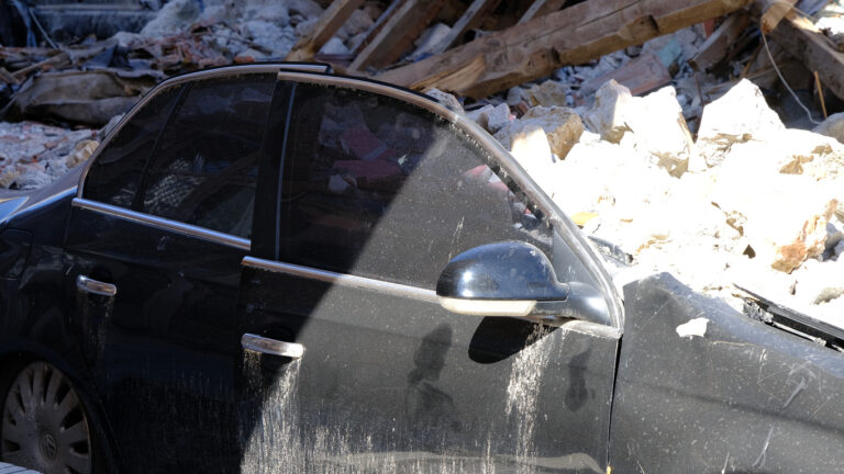 Collision sends car slamming into Berkeley house, injuring two.