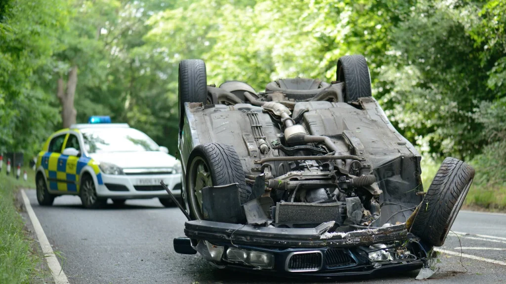 A man was hospitalized after losing fingers in a rollover collision in Frenso.