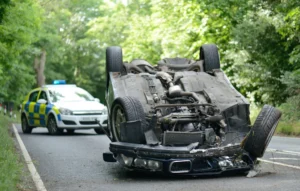 A man was hospitalized after losing fingers in a rollover collision in Frenso.