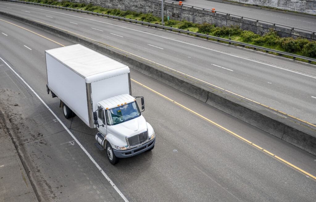 One killed in two-vehicle crash with box truck in Las Vegas.