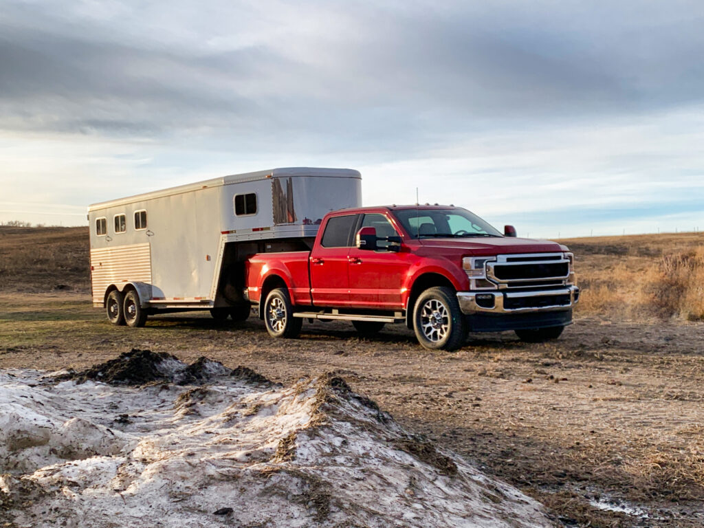 Several people injured in a collision between a car and pickup hauling a horse trailer in Hidden Meadows.