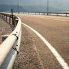 Two-vehicle crash on I-15 in Victorville leaves car wedged under guardrail, injuring 1.